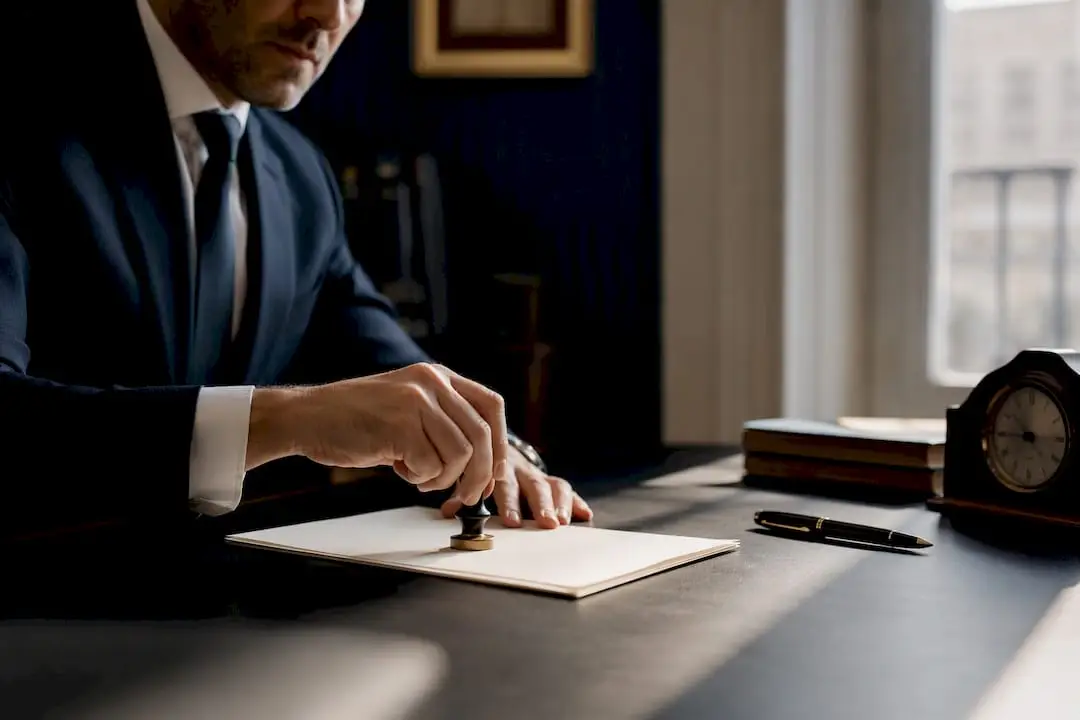 Notary sealing contract in Italian office